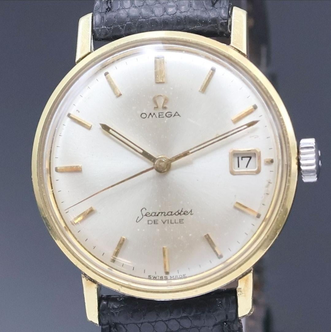 Omega Seamaster De Ville 166020 gold cap manual (335)