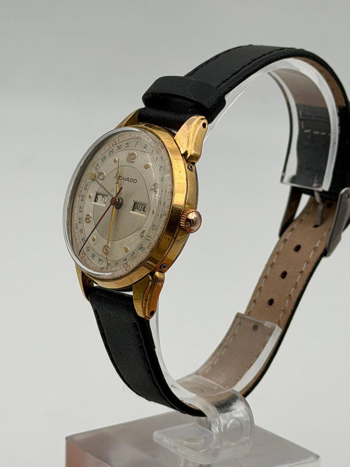 Movado Vintage Triple Calendar in gold and steel