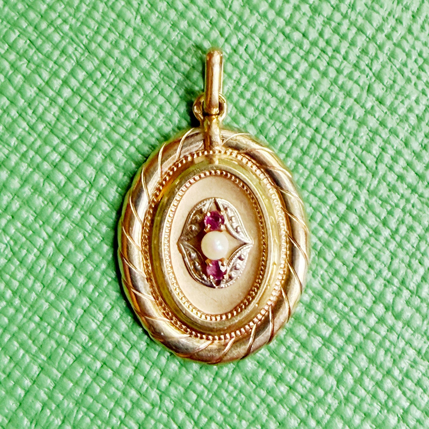 Antique French 18k tricolour gold hollow pendant with natural pearl and ruby, millegrain setting, twisted rope border, circa 1875, eagle hallmark