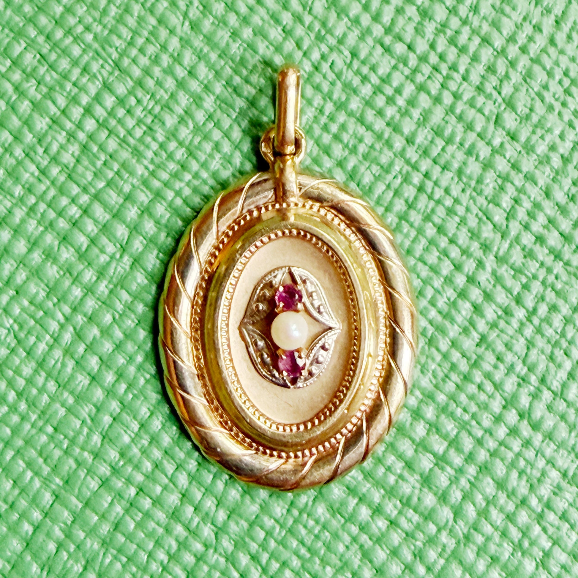 Antique French 18k tricolour gold hollow pendant with natural pearl and ruby, millegrain setting, twisted rope border, circa 1875, eagle hallmark