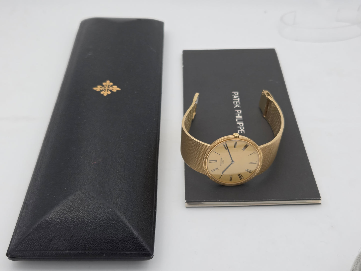 Patek philippe ref 3588 new old stock full set 1974 18k gold clous de paris